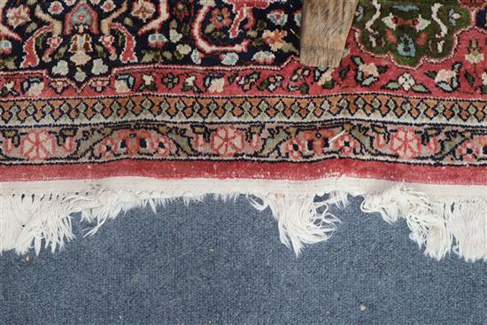A Persian pattern rose ground cotton and silk rug 298 x 215cm